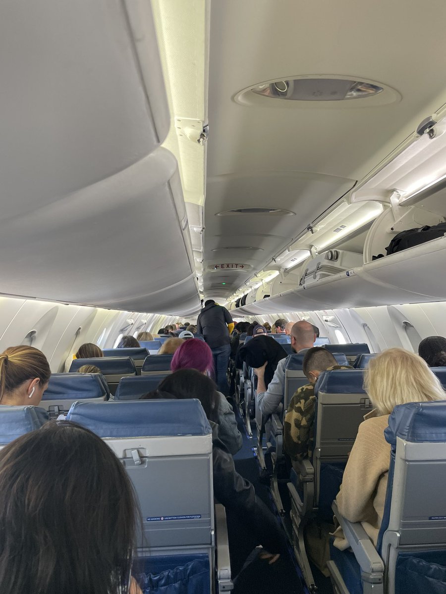 From first class and Delta Comfort+ to back of the bus. But at least we’re finally heading home.