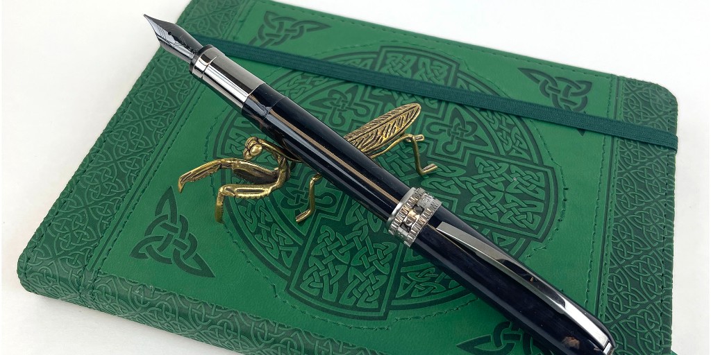 PenChalet's tweet photo. Did you hear the news?! The new Sassy Brassy Praying Mantis pen rest is the sassiest of them all?!🤯 You just might need to get your own to see all the sass for yourself: https://t.co/aq9svARye9 #penrest #prayingmantis #penholder #brasspenholder #brasspenrest https://t.co/kcPiSrHDXw