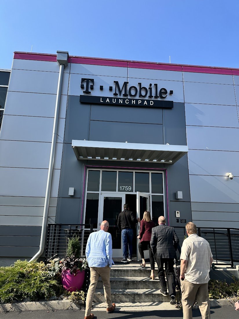 greengart's tweet photo. Wrapped up #TFBAnalystSummit with tour of the @tmobile [building]. The only photos we were allowed to take were of the endless patent wall, but lab tours are always fun. https://t.co/elybbFJ1es