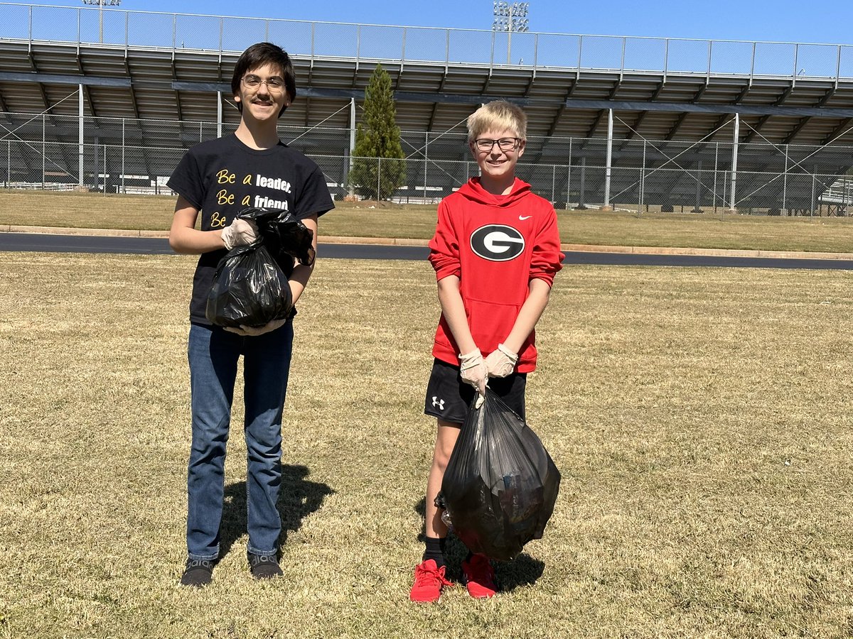 These 4 volunteers decided to give up their half day to help get our campus clean. Jr. Beta students are the BEST!