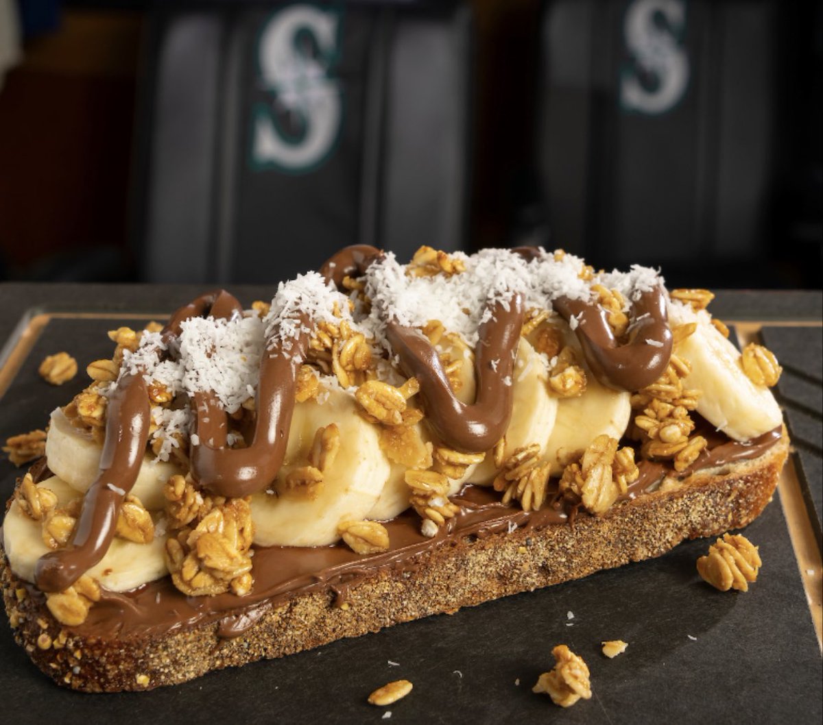 darrenrovell's tweet photo. New at first @Mariners playoff home game in more than two decades: 

Pure Acai Nutella Toast!

(Via @sodexo_live) https://t.co/ZlcRgnM8JM