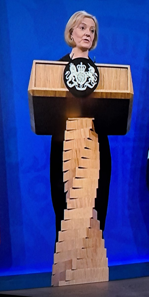 Anyone know why Liz Truss did her press conference dressed as The Angel of the North?