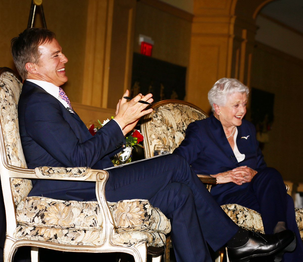 RobertNBCLA's tweet photo. The moment in 2016 when I asked Dame Angela Lansbury, “You’ve been nominated 18 times for an Emmy and never won. Does that bother you?” To roars of laughter in the Biltmore ballroom she exclaimed, “It bothers the hell out of me!” #RIPAngelaLansbury. @LAPressClub @TheEmmys https://t.co/k4JvqANZ9j