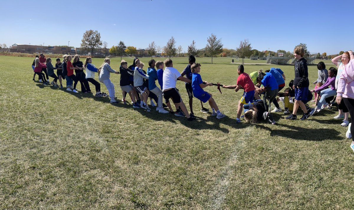 amyreiter's tweet photo. The time you are the human middle line for the tug-of-war game at the end of the Q1 celebration #somuchfun #loveourkids #team6-3 @HJHPanthers 💙 @MissPinkerton14 https://t.co/XEUBky3YfM