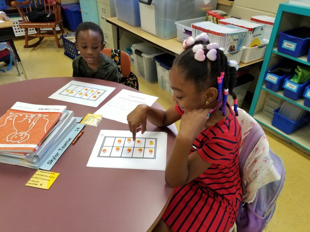 pleasantgrovees's tweet image. Mrs. Clements, our math coach, enjoyed teaching a lesson in Mrs. Howell&apos;s kindergarten class. The class counted candy corn for the lesson on Counting Collections. #numbersenseroutines