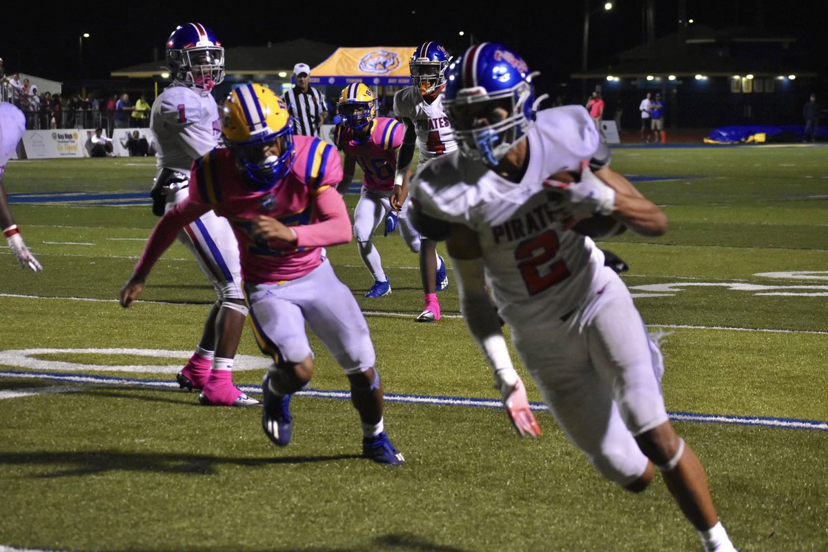 Jacquez Alexander-Dedeaux runs in for his second touchdown as the Pirates take a 24-10 lead with 1:45 left in the game.