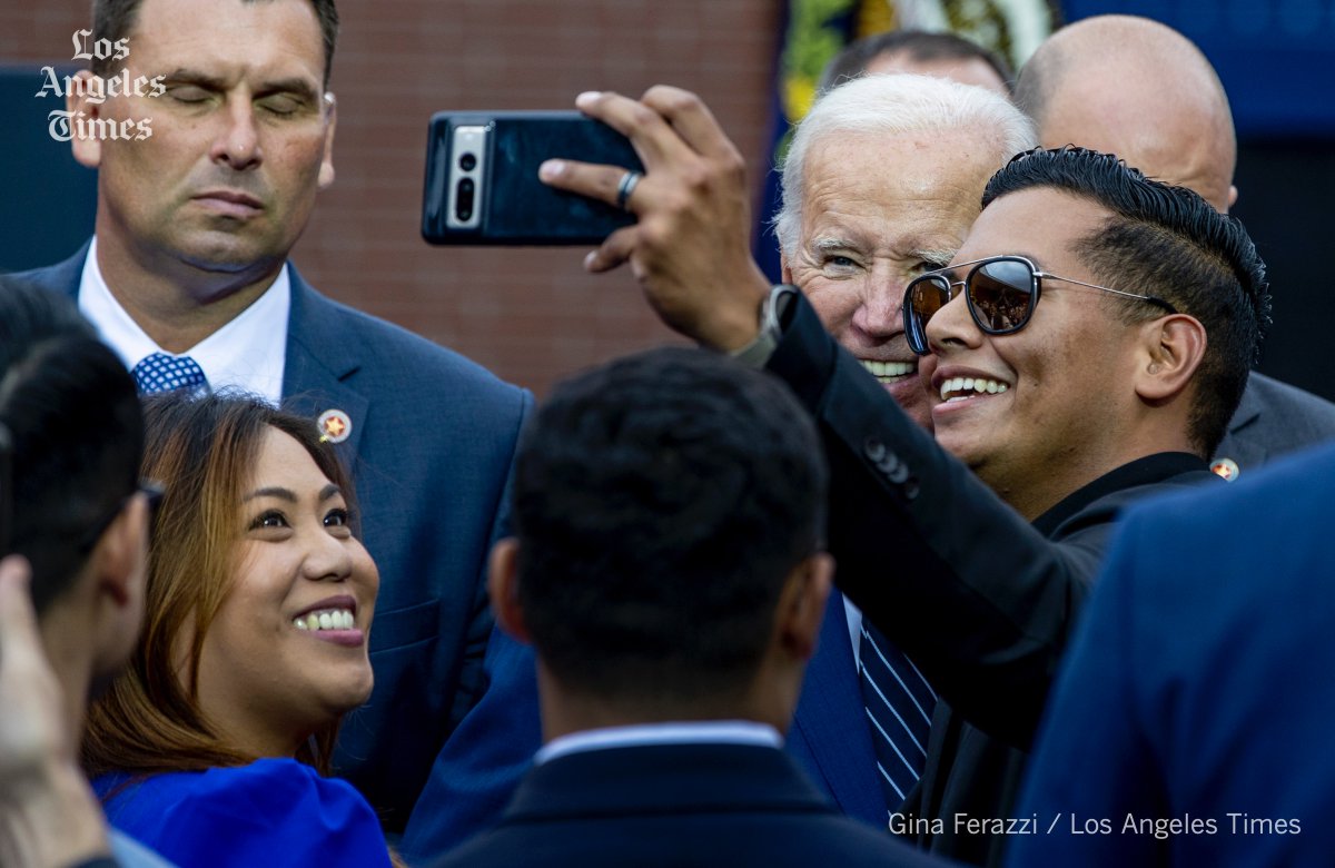 GinaFerazzi's tweet photo. President Biden takes a selfie with a supporter after speaking about lower costs for Americans at Irvine Valley College  in CA #POTUS #SocialSecurity https://t.co/8nDMoY4Fm0