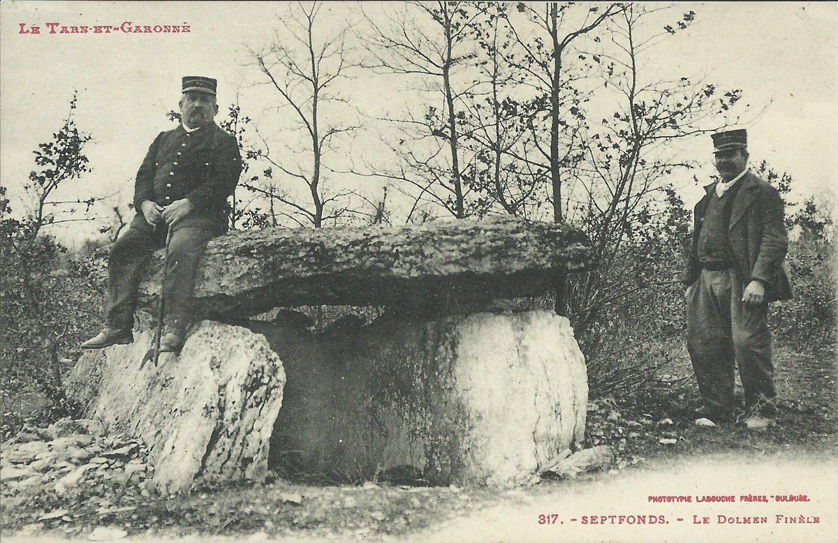The dolmen of Finelle A in Septfonds (Tarn-et-Garonne) was part of a small necropolis with four others. Its architecture is typical of the region with a capstone on one broad orthostat each side and a terminal slab set between the lateral supports. Card by Labouche c.1905.