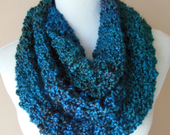 jvozsol's tweet photo. Teal Blue Black Purple https://t.co/YvrJi8Q7PE via @EtsySocial #etsymntt #handmade #infinityscarf #bluescarf https://t.co/jDU7Hd3JxH