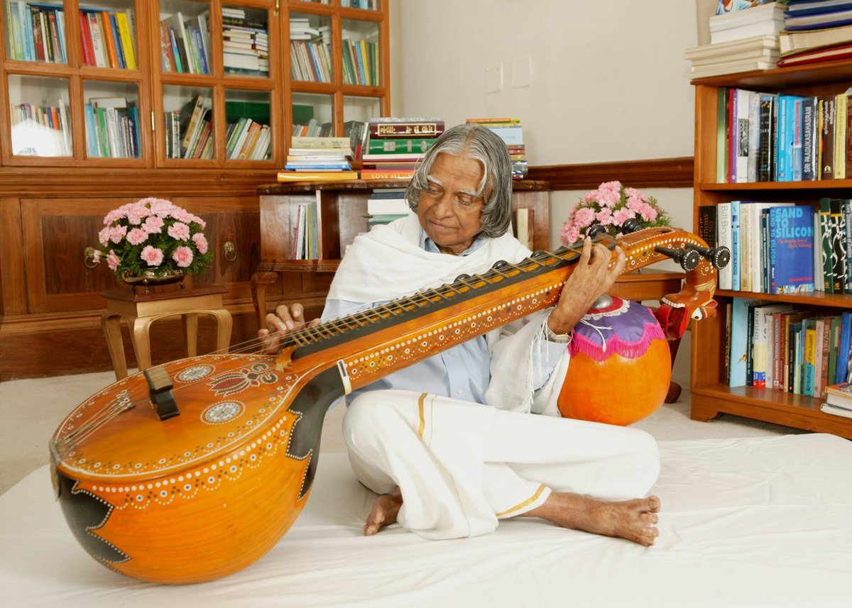 President Dr APJ Abdul Kalam relaxes by playing the veena, in the Family Wing of Rashtrapati Bhavan. (17 November, 2004)