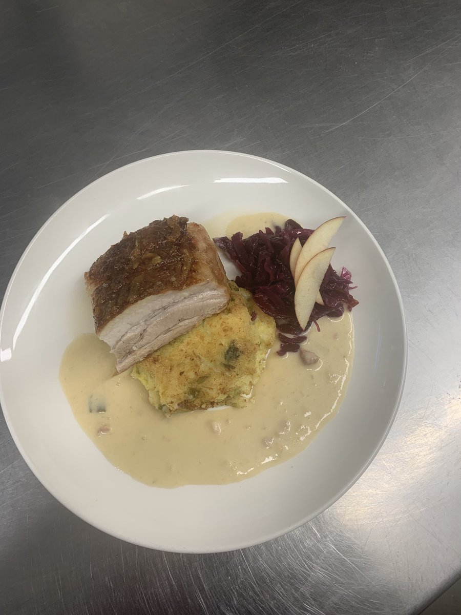 Special for tonight, Porkbelly over colcannon potato cake, braised red cabbage and brandy,smoked bacon n apple cream!