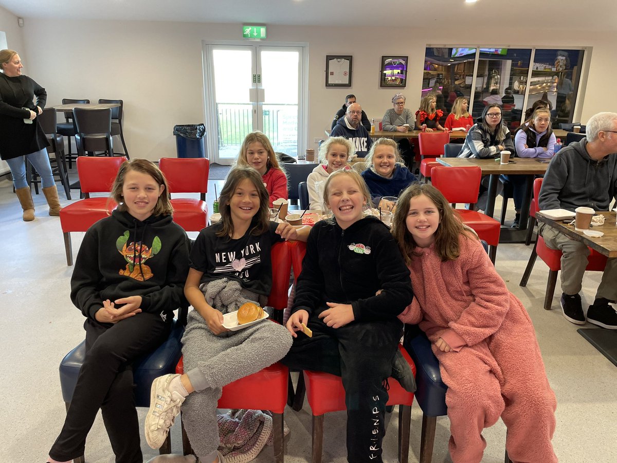 mrmattkuhn's tweet photo. Our newest girls team, the mighty Medway Girls U12s, supporting the red roses, all wearing their onesies - that’s how early it is. #lovedandfeared @RFU https://t.co/297Ndxj14X
