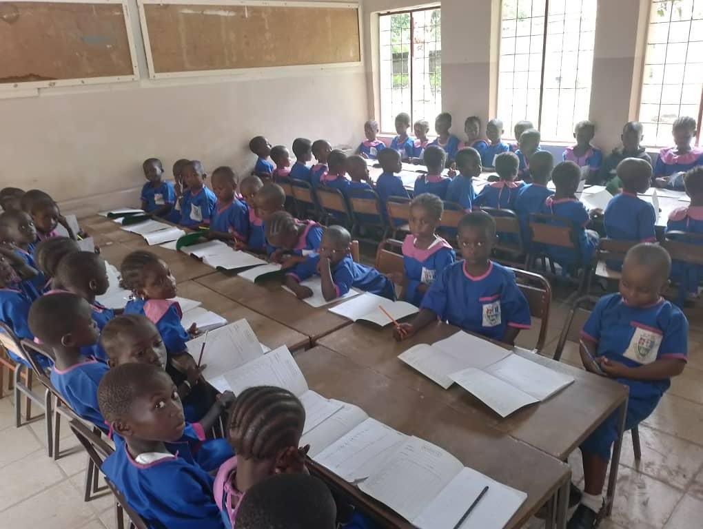 ProjectGambiaCL's tweet photo. Thank you to everyone who donated towards the purchase of handwriting books for the children at St Peter’s Nursery. They are busy writing in the classrooms that thanks to your support have a new roof and windows. #projectgambia https://t.co/KaPqTLXXMz