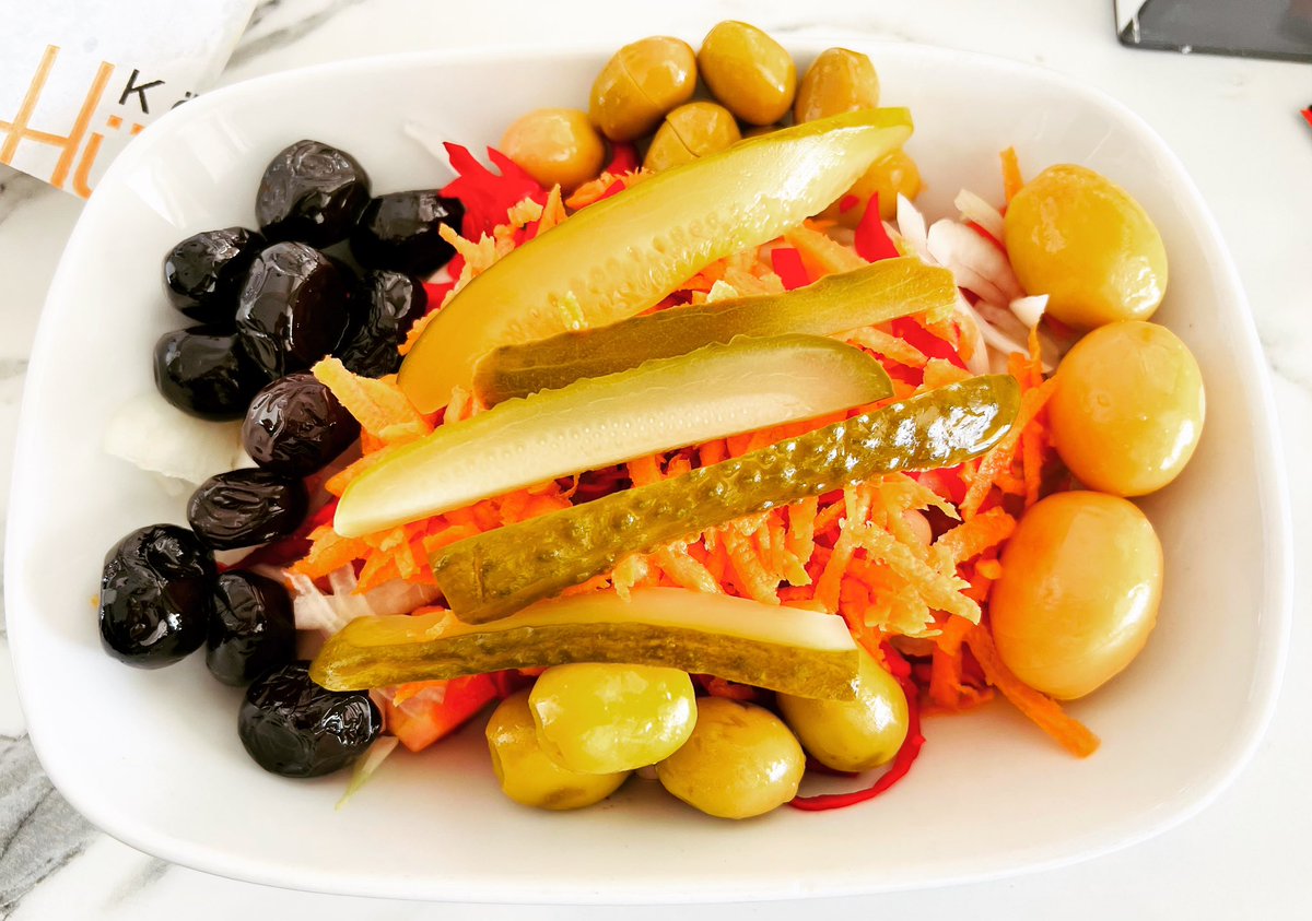 LatinVegan's tweet photo. This wonderfully tasty salad was specially prepared for me at one of the rest stops at Akhisar, Turkey. It contains four different types of olives, carrots, cabbage, pickled cucumbers, on a bed of white navy beans. #turkey #asia #veganfoodshare #whatveganseat #govegan #veganism https://t.co/zmGP7XAPHZ