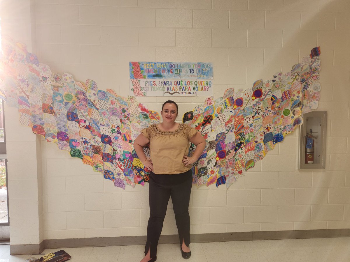 katesgen's tweet photo. @north_chatham How cool is this Frida Kahlo inspired project our awesome librarian @BeBibliophilic put together with our Jaguars! #OneChatham #HispanicHeritage #celebrateNCE #wallart #FridaKahlo #instructionalcoach #inspirededucation #librarylife #crosscurricular #creativity https://t.co/ne4lChRoco