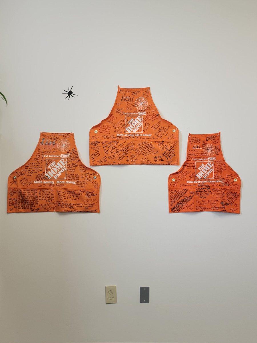 Eating lunch,Look over at the wall (yes I know, I need frames) start reading the LOVE in the words on these aprons, and I melt a little. 🥲it's why over 25 years later I still bleed orange. 🧡The people. fyi,not a real spider.  #proudtobeorange <a href="/THDChrisOrsini/">Chris Orsini</a>