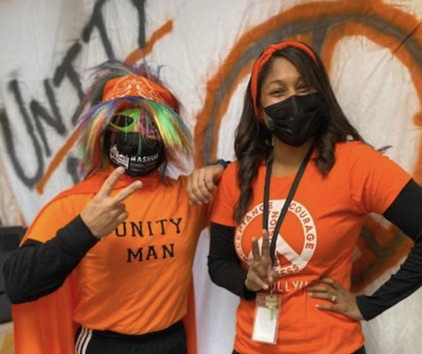 SarfdeK's tweet photo. @ChasTweets and AP Gagne will be leading the annual Unity Parade next week! #Unity #OneNashua 🧡🖤🧡🖤 https://t.co/QCpUkK64Go