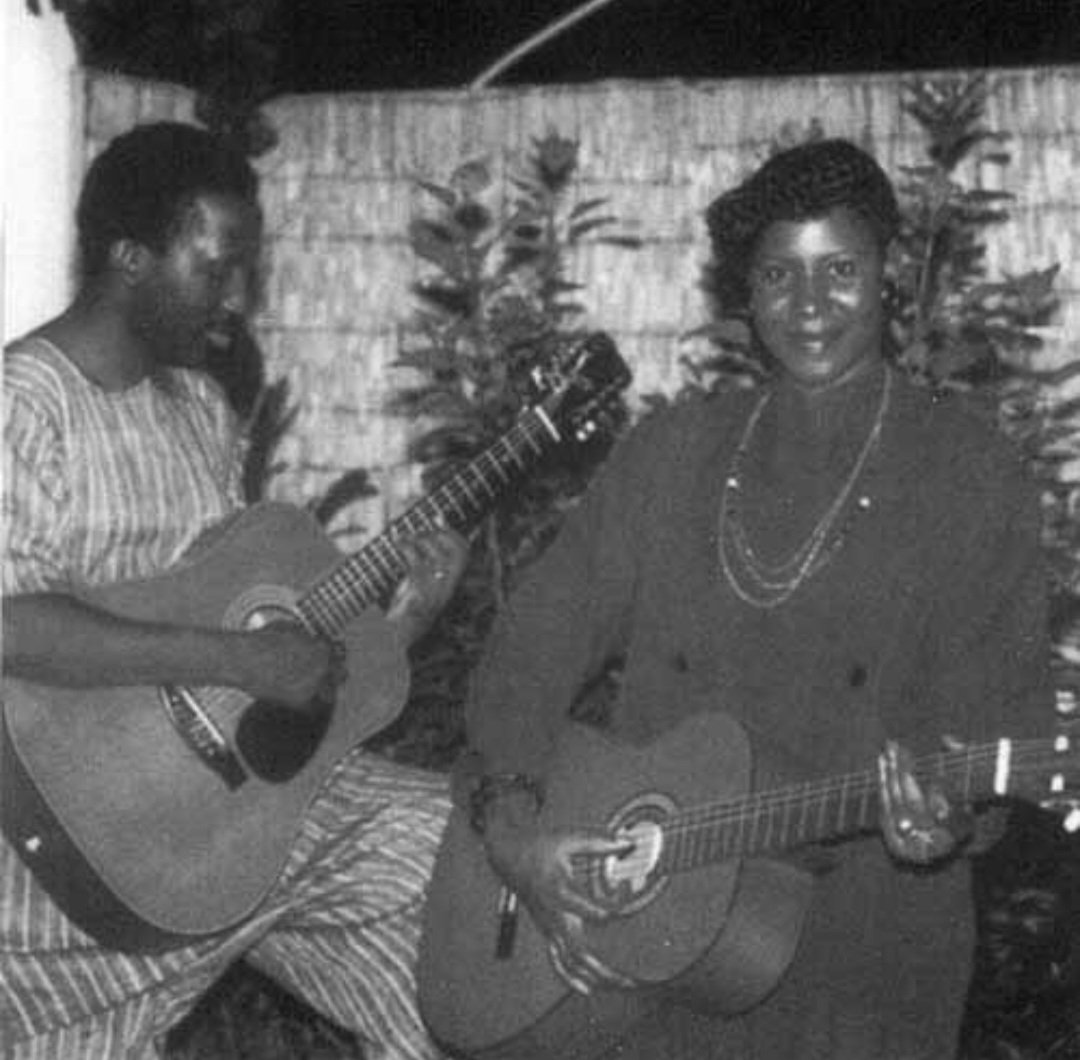 allimadi's tweet photo. On this day in 1987 the #African revolution was dealt a severe blow when Thomas #Sankara was murdered by Blaise #Compaore the reactionary agent of #IvoryCoast and #France. May he Rest in Peace with the Ancestors. In one photo he's jamming on guitar with Mariam Sankara. https://t.co/jnRIwrT1B1