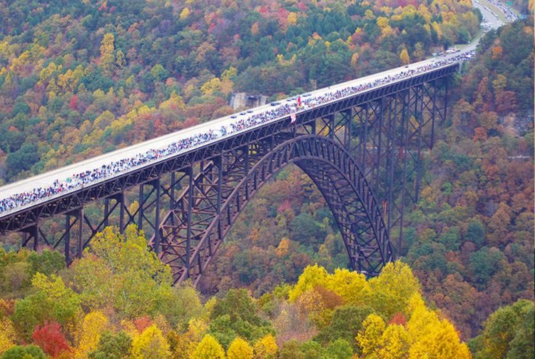 AprilShuff's tweet photo. Bridge Day, West Virginia Rastapult https://t.co/IotA0nP1ZM via @YouTube Today is WV’s largest single day festival. Thousands of ppl gather on the NRG bridge to watch daredevils jump into the Gorge below. #BaseJumpers
#BridgeDay2022 https://t.co/UaTz88zEdW