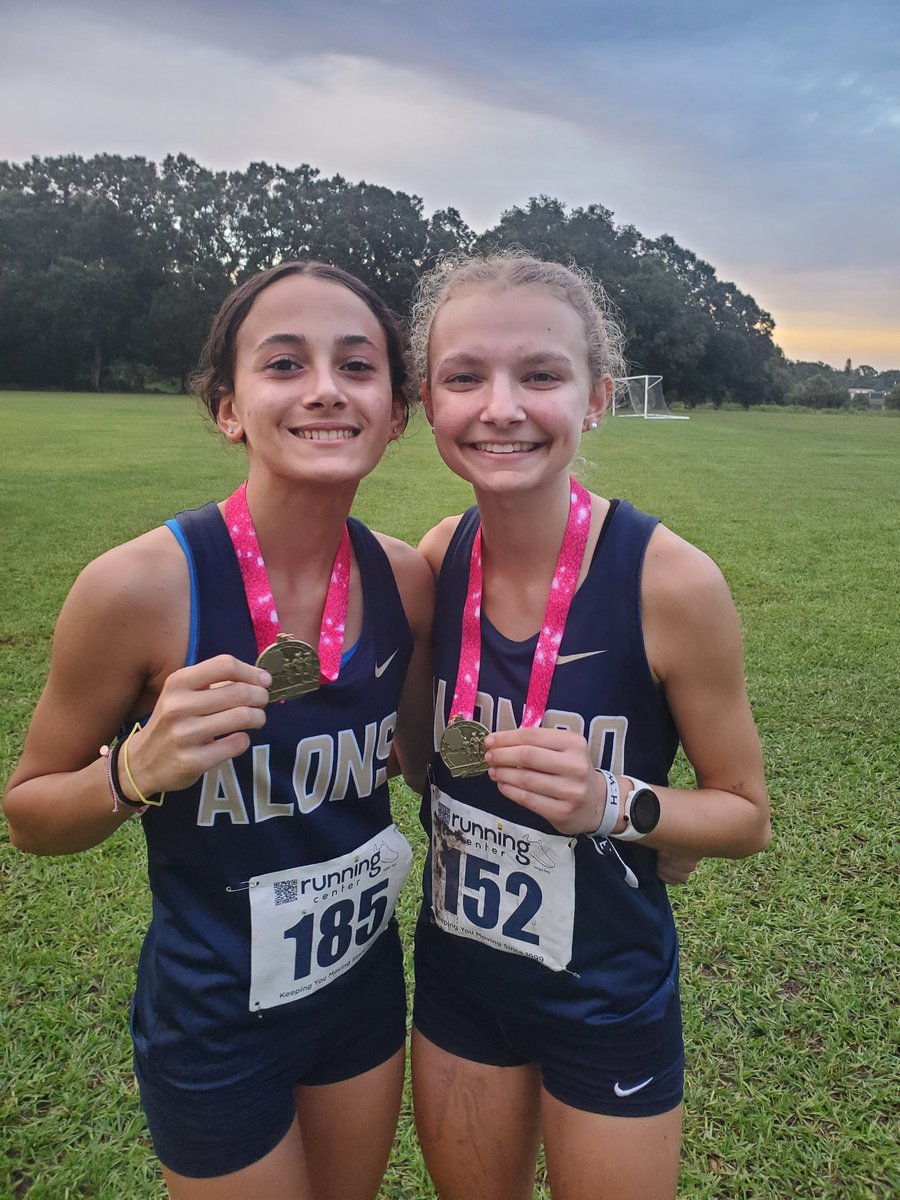RavensXCTnF's tweet photo. A dynamic duo as freshmen, seniors Nathalia Mallo (left) and Skyler Gillett enter the District/state series beaming with confidence, and carrying our team. We can't thank them enough for their dedication to the program! #PlanetRaven #respectoursport https://t.co/Ui6ItBZRae
