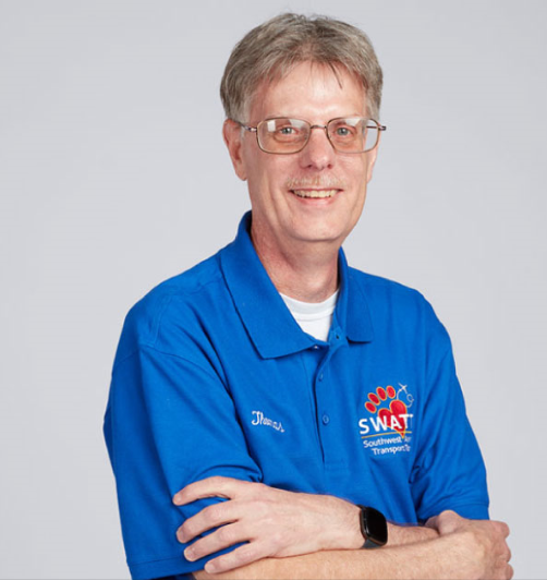 Thomas R. posing for a photo.