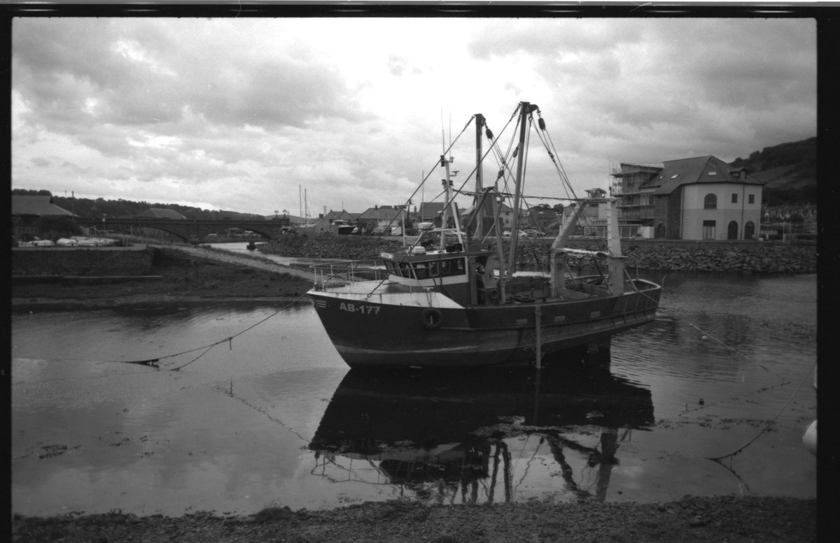 AlexG686's tweet photo. Rapidly scanned from the negative - Aberystwyth Harbour Basin. @ILFORDPhoto fp4 film, and the Pentax ME Super which lives in my rucksack. #pentax #believeinfilm #monochrome #water #ocean #analoguephotography #photography https://t.co/6YLY3vPpnp