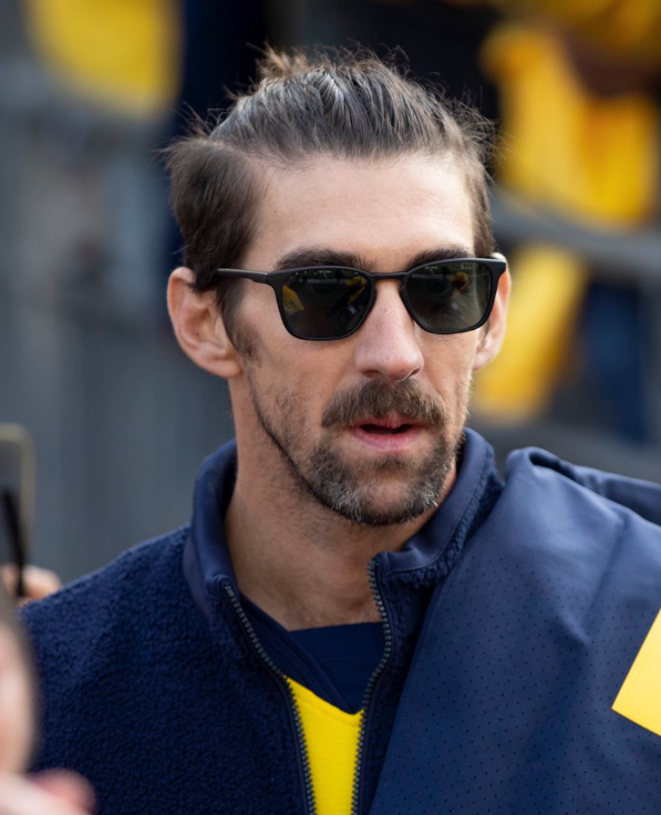 Michael Phelps looks like he's been doing ayahuasca retreats with Aaron Rodgers.