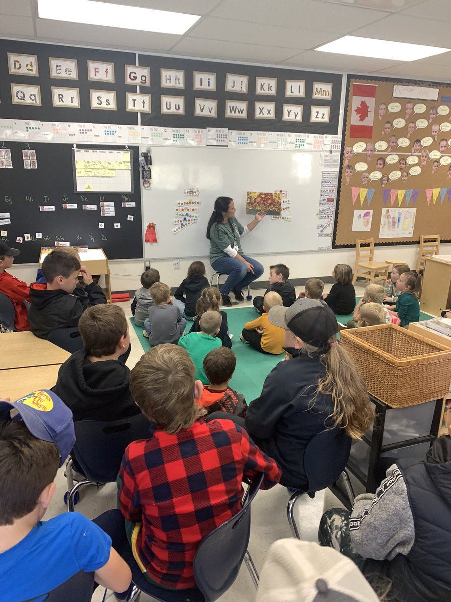 Listening to a fall story with our buddies. <a href="/SEWchargers/">SEWchargers</a> <a href="/MrsLalondeSTE/">Renee Lalonde</a>