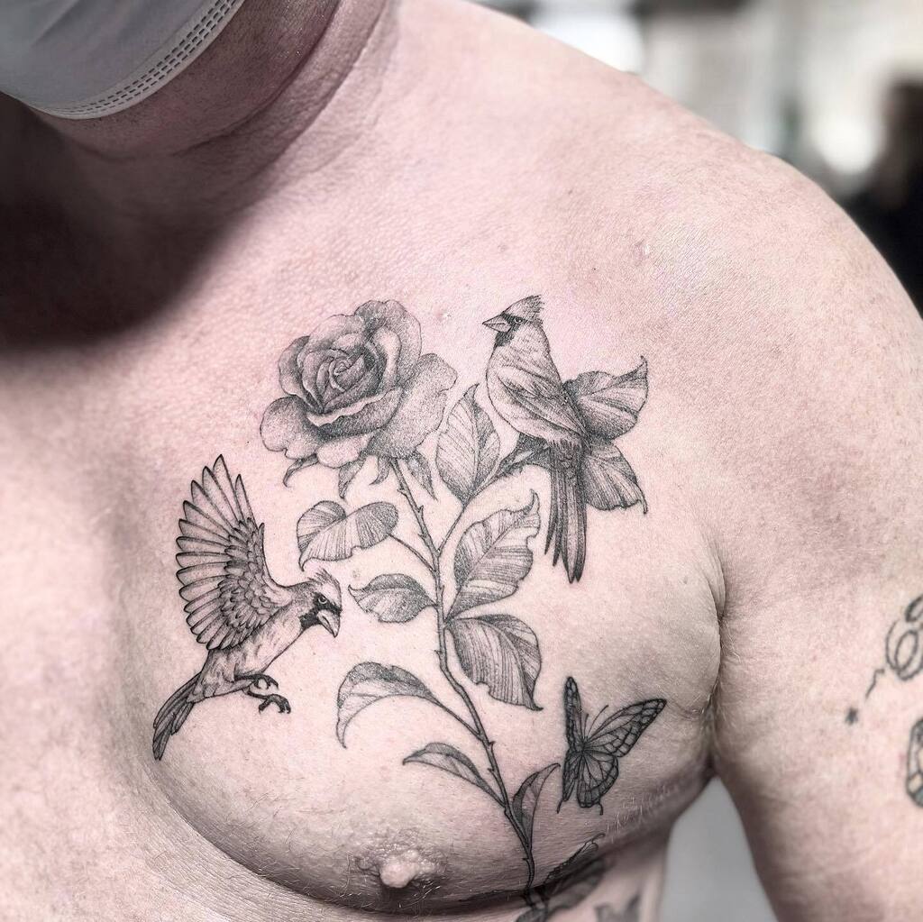 Wow, took me two sessions for this double cardinal, butterfly, single stem  of rose. But I'm so in love with the result! #rosetattoo #cardinaltattoo  #butterflytattoo #chesttattoo #ribtattoo https://t.co/SHJL8XyVYe, image size:1024x1023