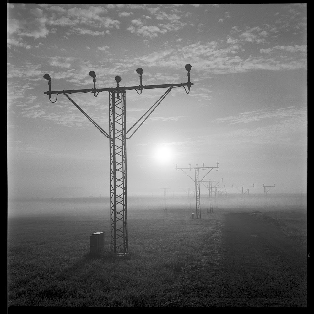 MickeRip's tweet photo. Morning mist at the aiport. Rolleiflex 3.5f, Ilford FP4+. #believeinfilm #istillshootfilm #analogphotography https://t.co/YHIyMnkVmi