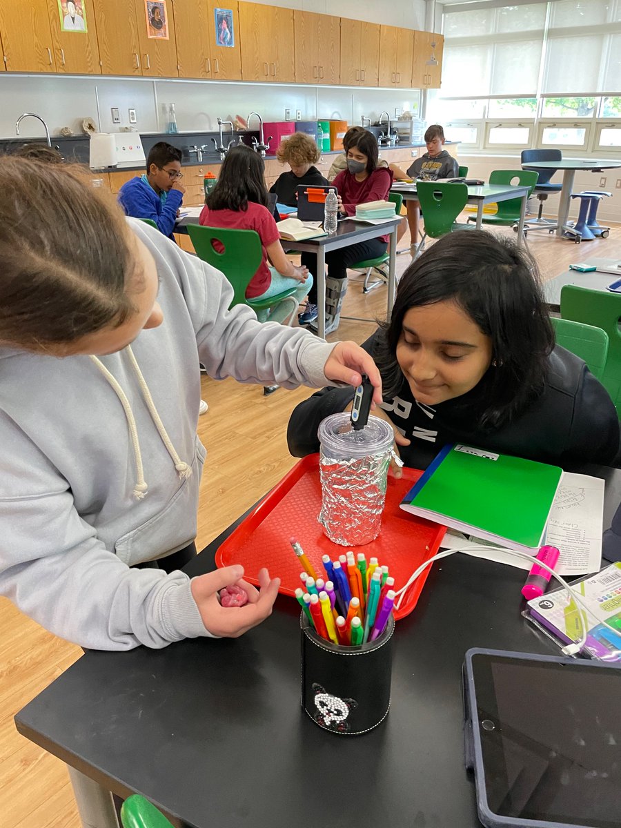 Students testing out thermal energy loss in different cups. #inspire96