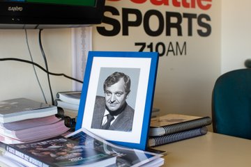 Photo of former Mariners broadcaster, Dave Niehaus, in the radio booth. 