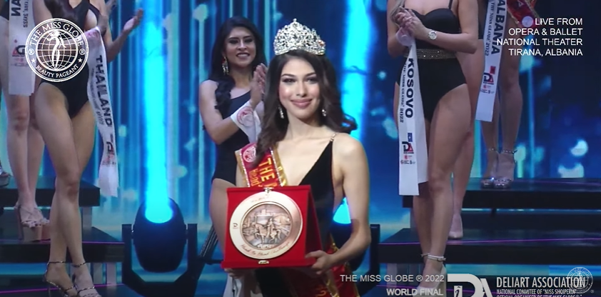 ABSCBNNews's tweet photo. Chelsea Fernandez of the Philippines receives her crown and award for winning the #MissGlobe2022 Head to Head Challenge. https://t.co/lGgga8hVSA