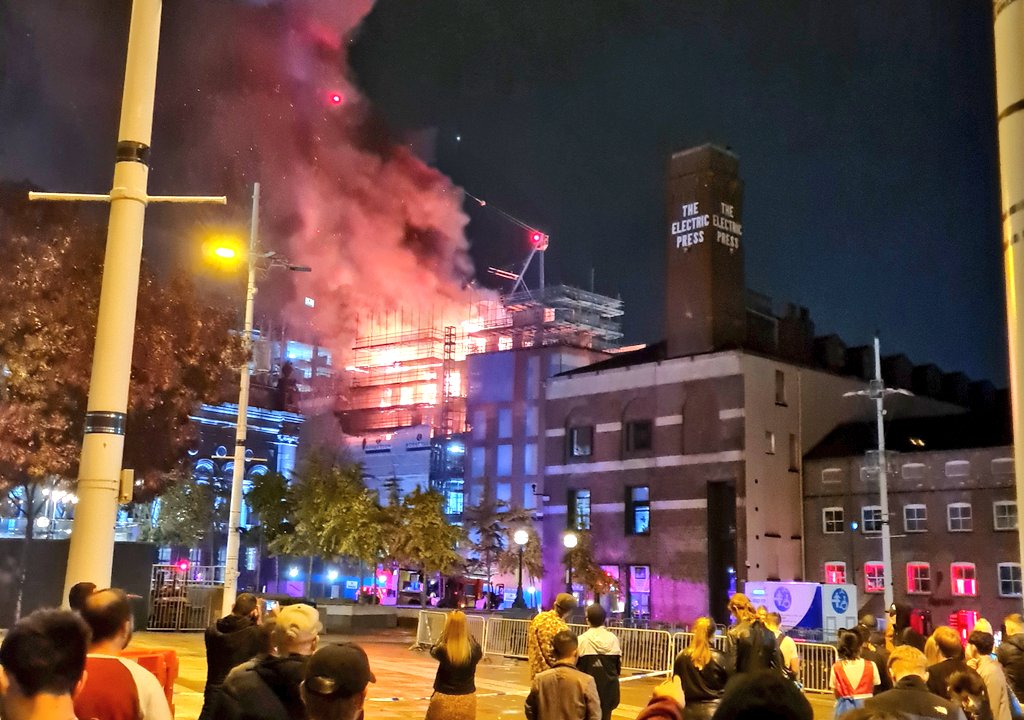 Avoid Leeds Millenium Square. Large fire in progress. <a href="/WYFRS/">West Yorkshire Fire and Rescue Service</a> <a href="/WestYorksPolice/">West Yorkshire Police</a> <a href="/YorksAmbulance/">Yorkshire Ambulance</a> on site. <a href="/carriageworks_/">Carriageworks Theatre</a> <a href="/ElectricPressLS/">The Electric Press</a> 🔥