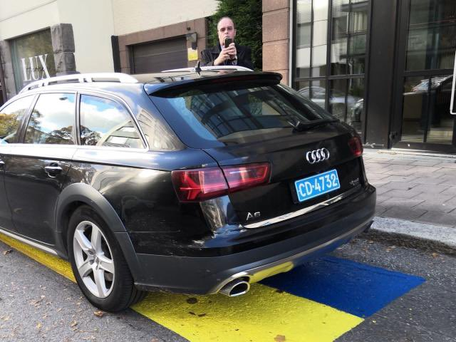 M_WrenchGang's tweet photo. Two Finnish men 'annexed' a Russian diplomat's parking spot in the Finland’s city of Turku, by painting it with the Ukrainian flag.

They called it the result of a "2-man referendum" on "annexing" the spot. The city announced it would not paint over it. https://t.co/1GbWVWCSIV