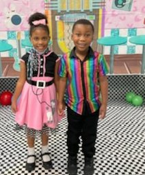 TraceyLHunter2's tweet photo. Our staff and students had a rockin’ good Friday in our '50s attire as we celebrated the 50th day of school with hula hoops and a Sockhop! @craighead_lions @cmcshan3 @MobilePublicSch #RockingRobin #TheTwist #BeEXTRAordinary #LearningLeading https://t.co/SwbYPEOHCv