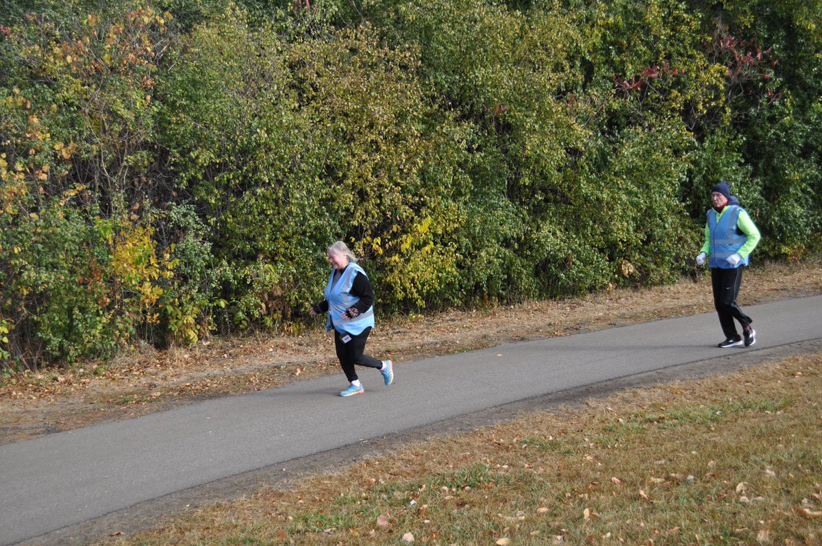 Lovin' the new vests!  parkwalkers Patty and Bill do the honors this week at we celebrate parkwalk at parkrun at Hamlet Park parkrun #23.