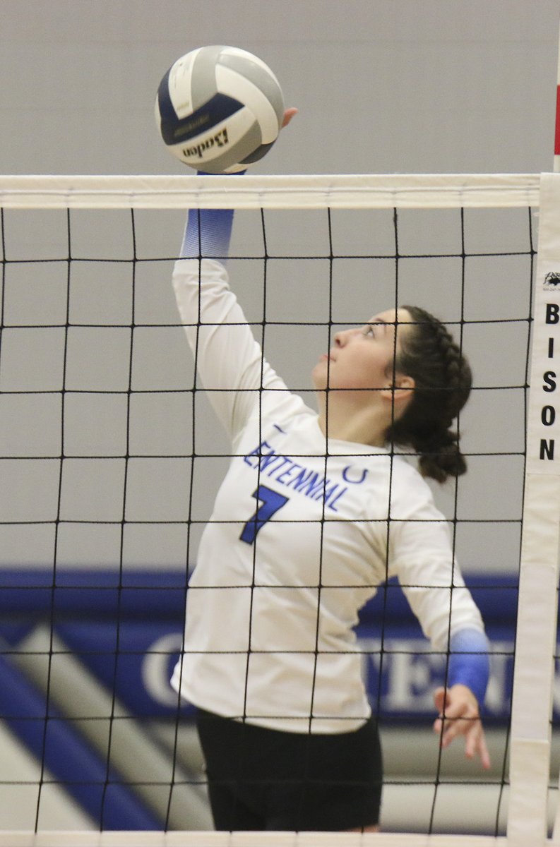 VB: <a href="/KarleyNaber/">Karley Naber</a> of <a href="/CentennialVB18/">Centennial Volleyball</a> sends the ball over the net against Wilber-Clatonia. #broncoblue #chsattack