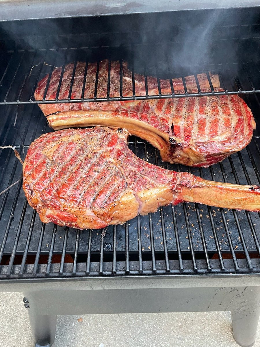 TheMichigan_Man's tweet photo. One of the best meals I've had in a while - Tomhawk Ribeyes covered in garlic butter. 4 people were feed off pretty close to a steak and a half. Also, the Traeger grill gave it fantastic flavor, as always. @TraegerGrills #Dinner #food #steak #tomahawk #beef #supper #traeger https://t.co/8bpkPoBVCh