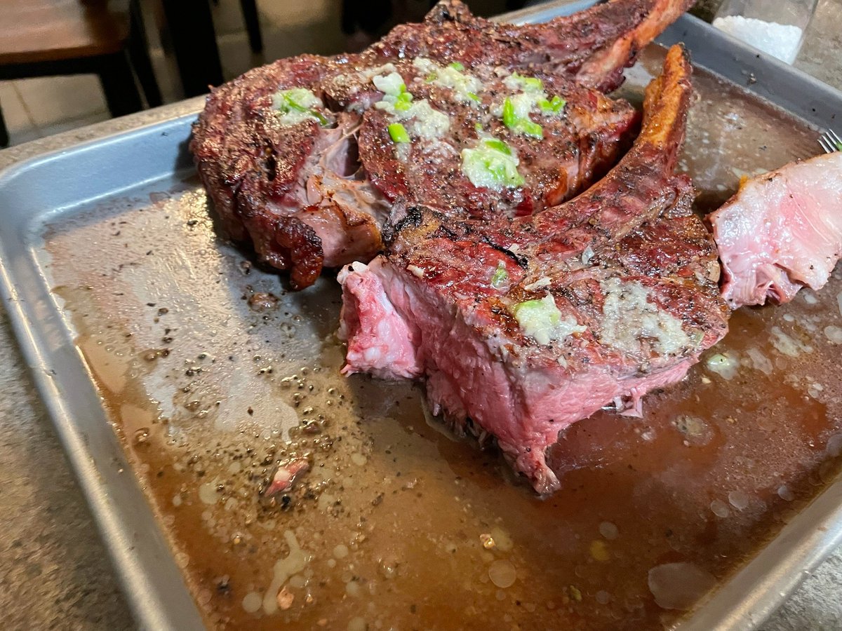 TheMichigan_Man's tweet photo. One of the best meals I've had in a while - Tomhawk Ribeyes covered in garlic butter. 4 people were feed off pretty close to a steak and a half. Also, the Traeger grill gave it fantastic flavor, as always. @TraegerGrills #Dinner #food #steak #tomahawk #beef #supper #traeger https://t.co/8bpkPoBVCh