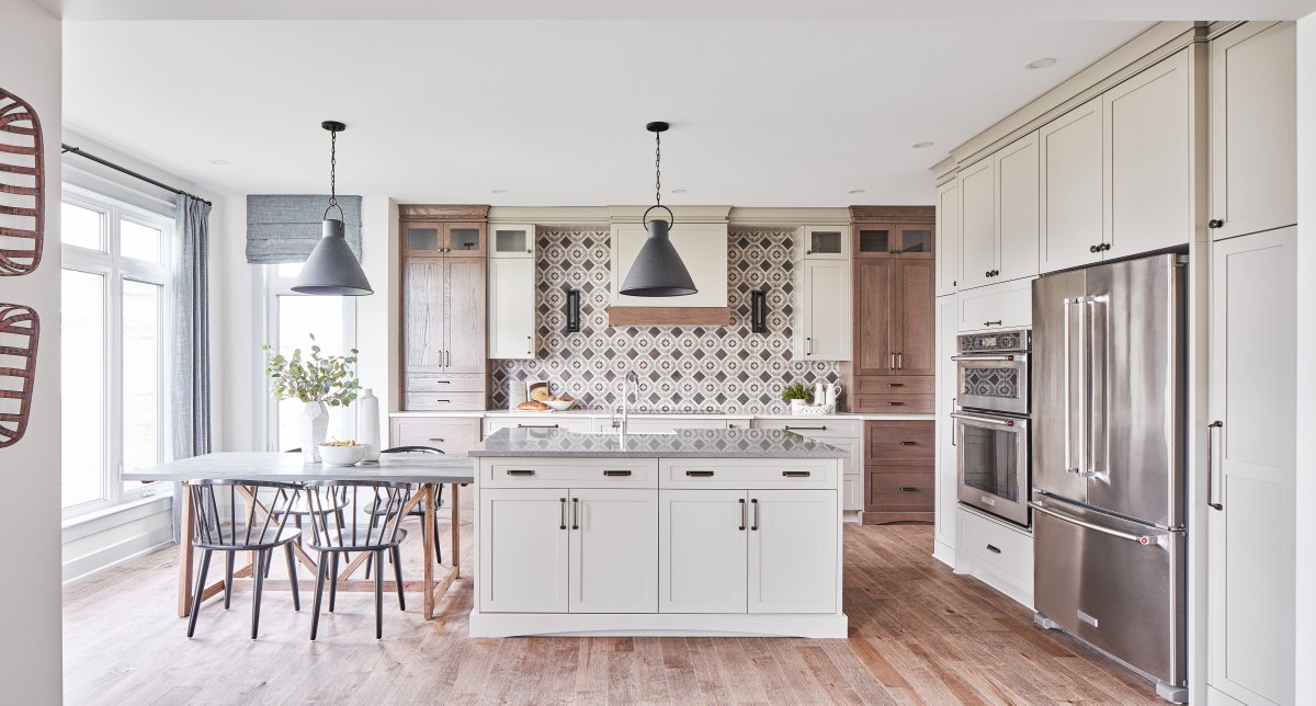 Production kitchen, 251 sq. ft. or more, is another win for <a href="/kinkadedesign/">Sonya Kinkade</a> &amp; <a href="/TamarackHomes/">Tamarack Homes</a>, this time for an inviting space that is a “blend of warm hues and toasty neutrals” 
#GOHBAawards