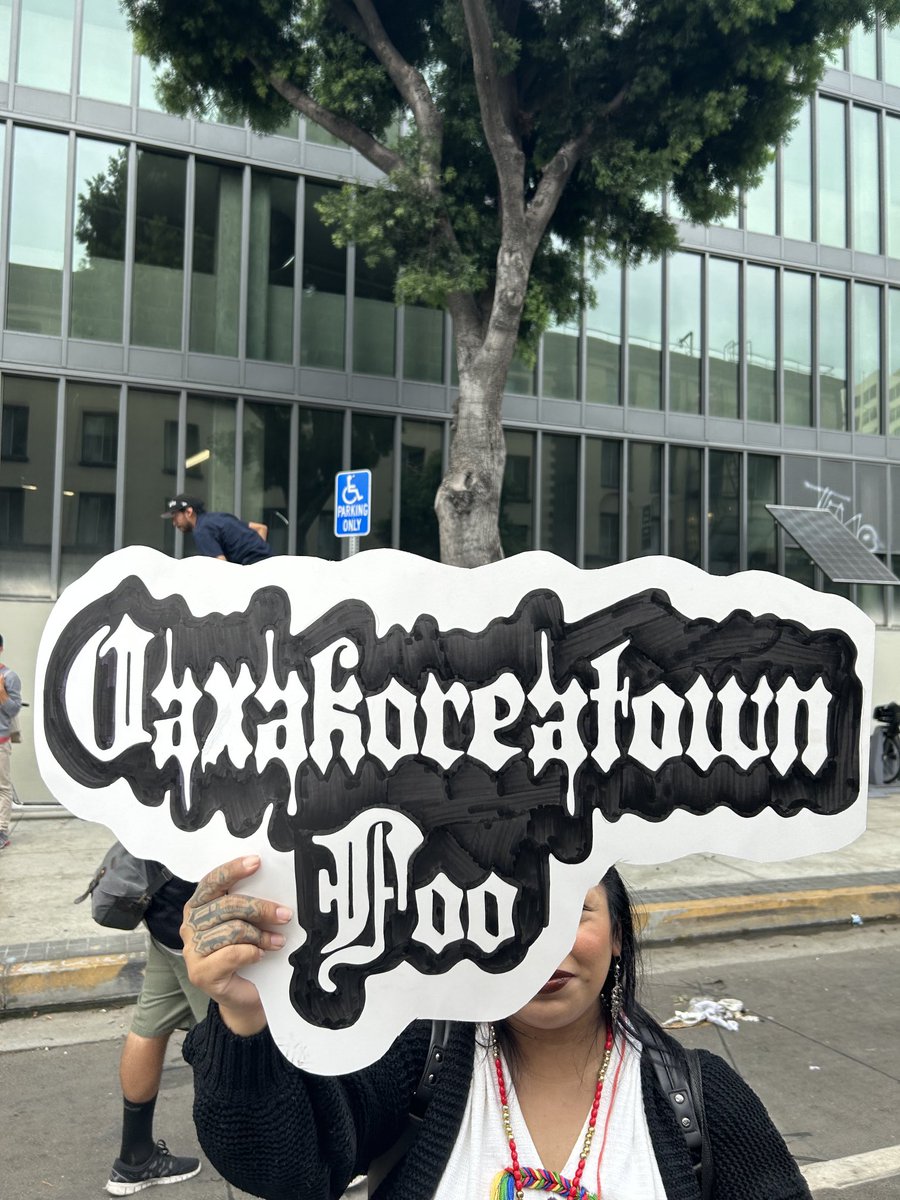 PalmTreesnGz's tweet photo. This is one of the flyest signs I saw being carried by a compa: “Oaxakoreatown foo” https://t.co/VfwzHPjJxH