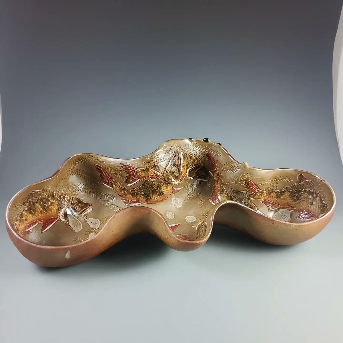 StasevichStudio's tweet photo. Well that didn't last long.  This pot didn't even make it through one show before finding a home.  Not gonna lie, I was kinda hoping I'd get to keep touching it for a while longer.  It's good when pots find homes, but it's hard to say goodbye, too. https://t.co/KwExQggqwK