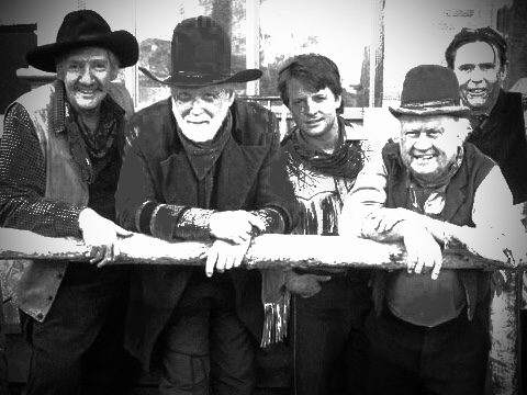 KKHV700's tweet photo. Strange co-incidence? 

If you recall the sailor hit by Mr Baines car the other week, he has a striking resemblance to the man (center) in this photo from 1885, discovered in the Hill Valley archives! https://t.co/UDOuBM4f8y