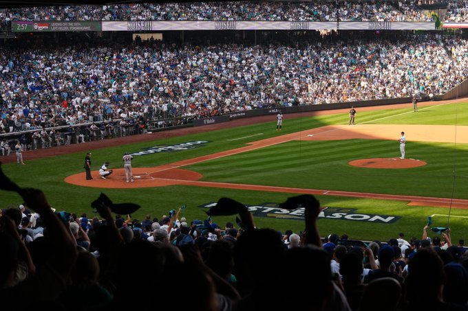 Mariners fans wave rally towels during ALDS Game 3.