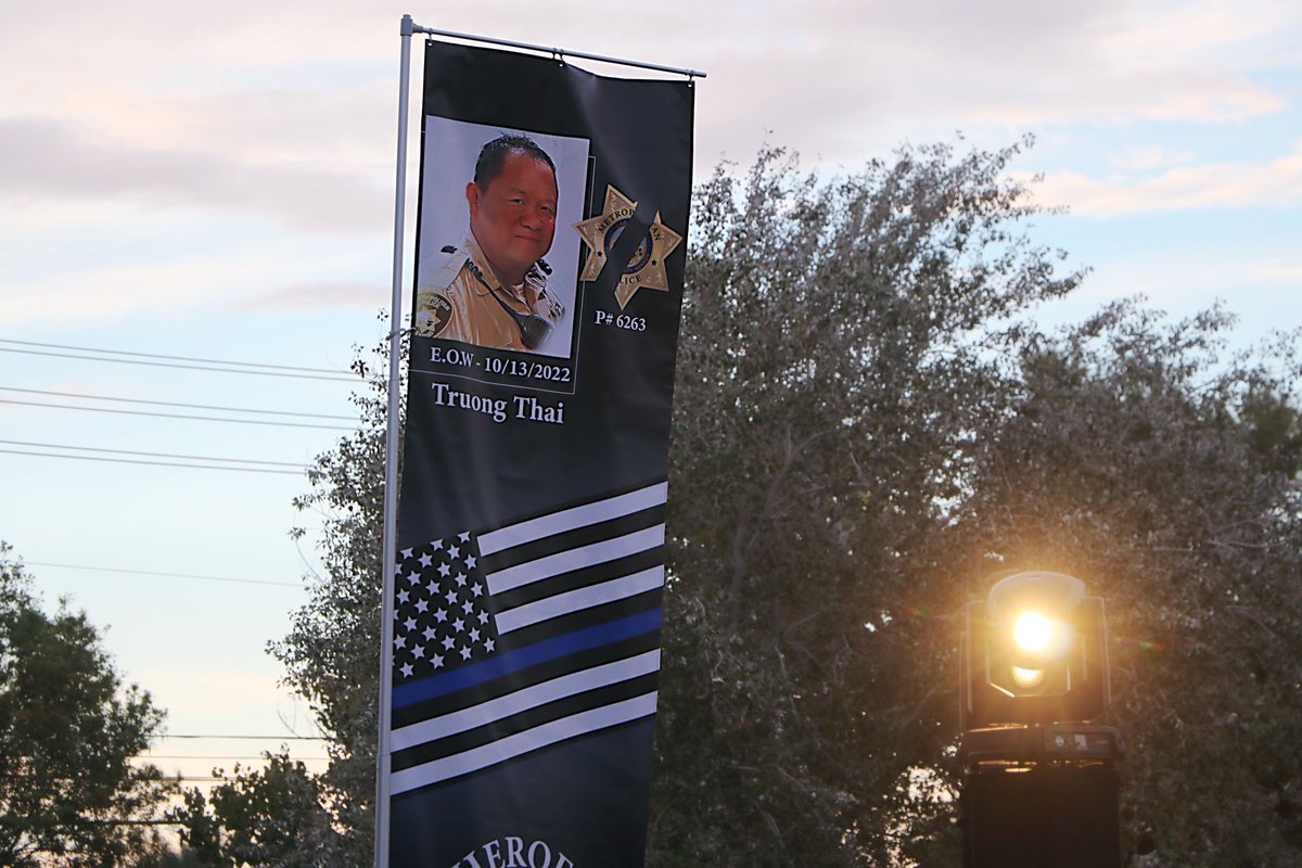LVMPD's tweet photo. We are humbled by the show of support from the community for @LVMPDSCAC Officer Thai. We are especially grateful to the @IPOFNV and everyone who helped make this a special vigil to honor our fallen friend tonight. https://t.co/bE2NIDZCsl