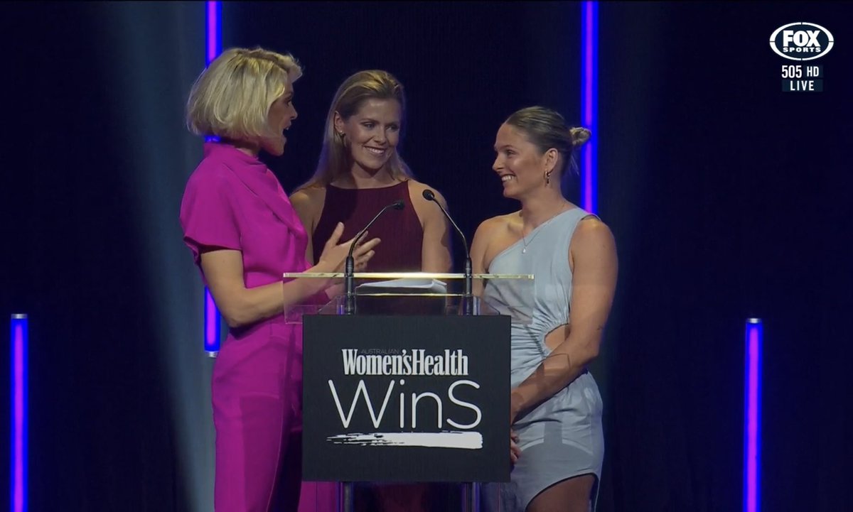 SydneySwansAFLW's tweet photo. Alana Woodward and Lisa Steane up on stage at the Women in Sport Awards tonight in Sydney 🙌🏽  #WHWINS https://t.co/R28xBLAiCf