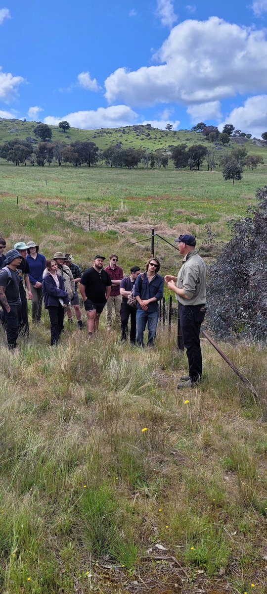 FionaDyer's tweet photo. The chair of Hovells Creek Landcare Group speaking with @UniCanberra @UCSciTech Integrated Catchment Science students about managing gully erosion. @UC_CAWS #fieldclass focussing on current case studies and contributing to community based @LandcareAust activities https://t.co/C3oJfVInA9
