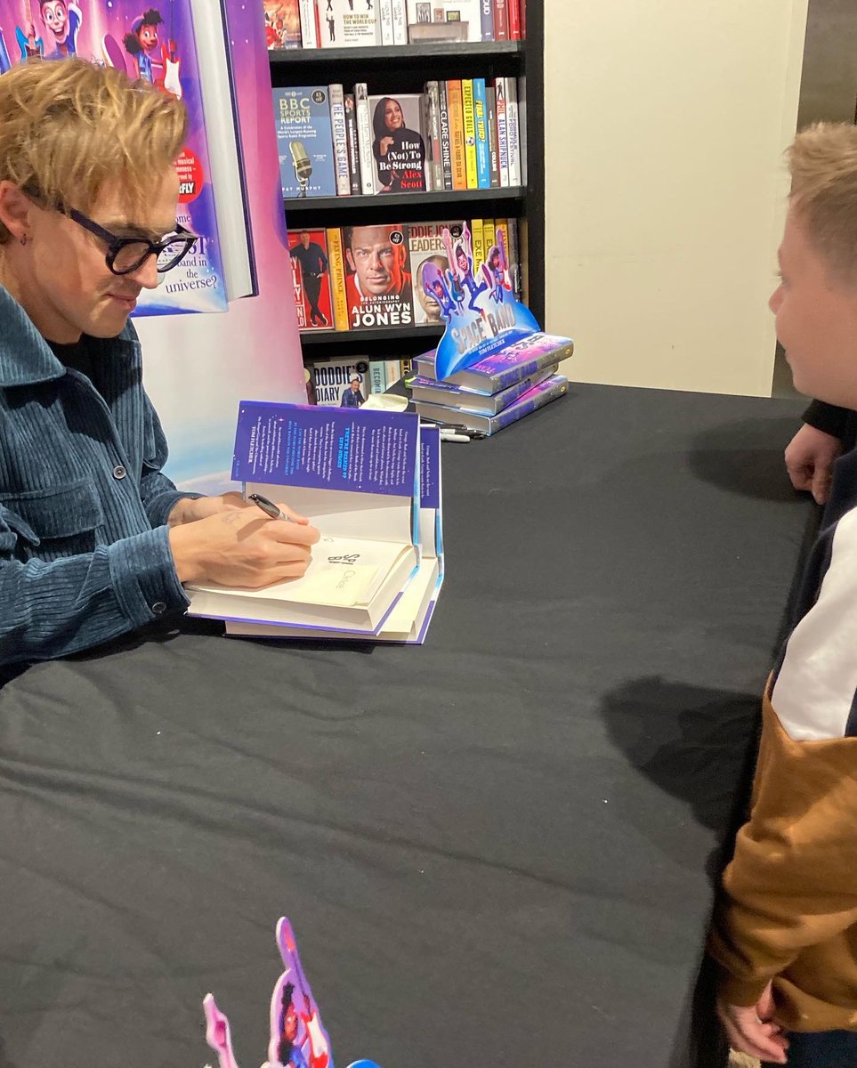 ClaireLHarne's tweet photo. Book signing today @Waterstones in Nottingham today! Although Jaxon was shy while meeting @TomFletcher you can see how excited he was by the first pic here afterwards! Honestly his best day ever! #Bookworm #HalfTermRead #RiseParkReaders @RiseParkSchool https://t.co/zK1AEIFNH6