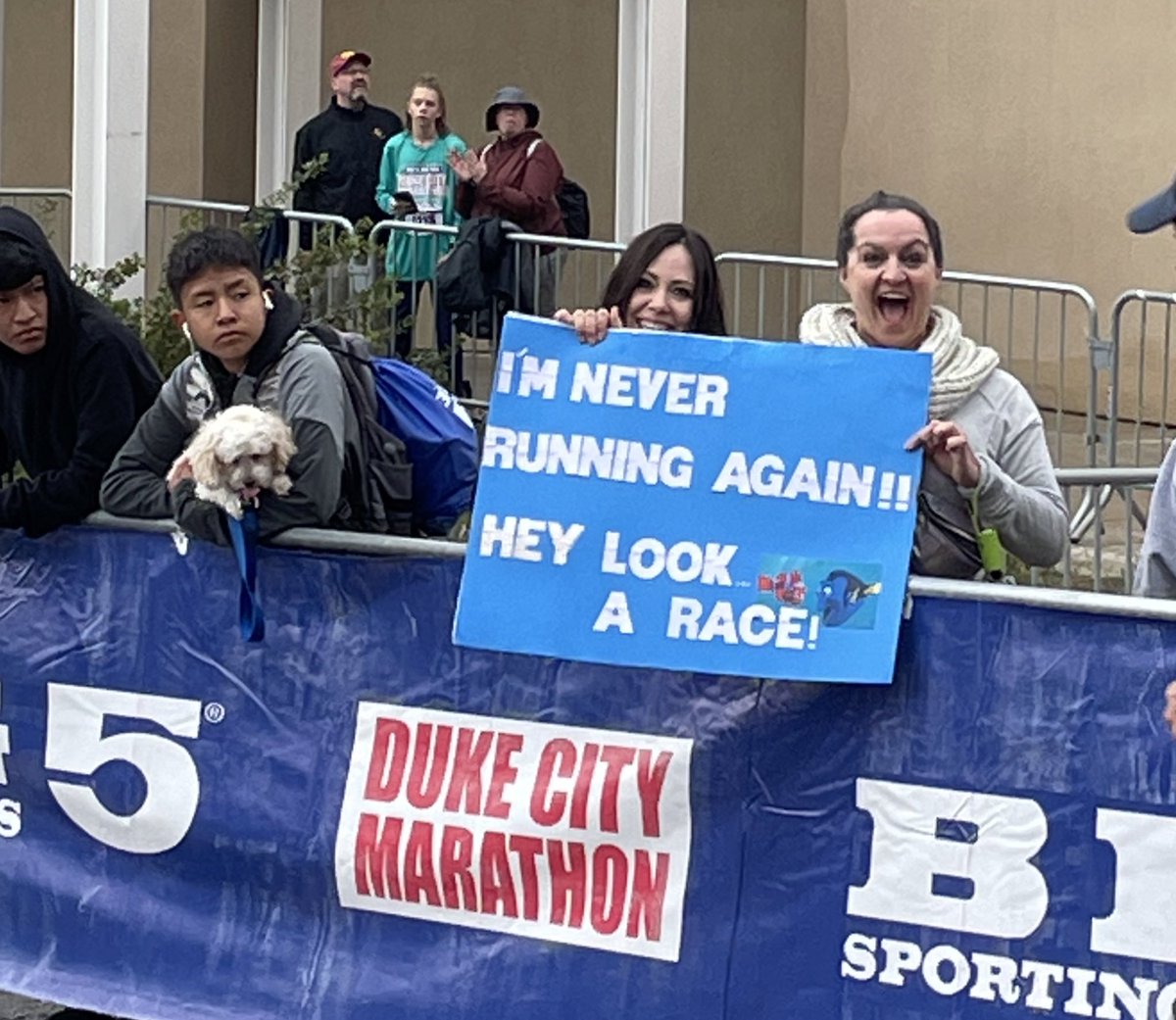 DukeCityRun's tweet photo. Itβs all about the signs! #RunDCM https://t.co/r3OHuDdRHv